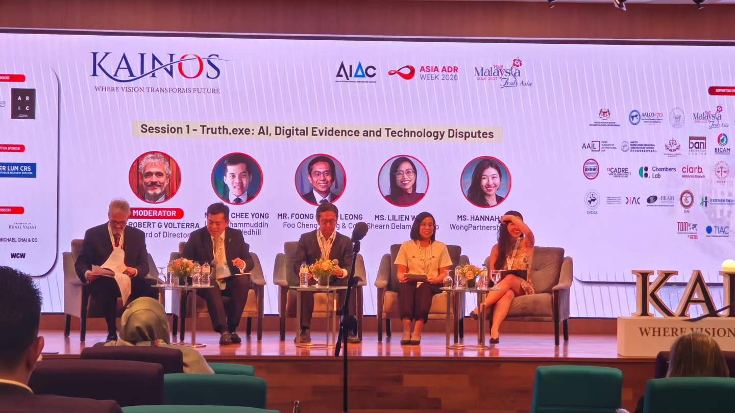 Five panellists on stage beneath a screen for the KAINOS session Truth.exe on AI, digital evidence, and technology disputes